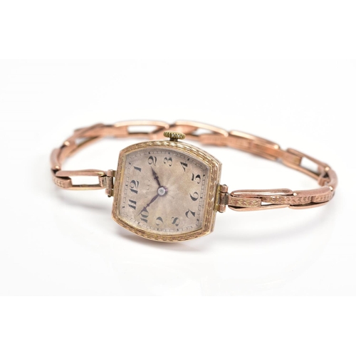 51 - A 1920'S 9CT GOLD ROLEX SIGNED WRISTWATCH, designed with a tonneau shape head with engraved detail t... 