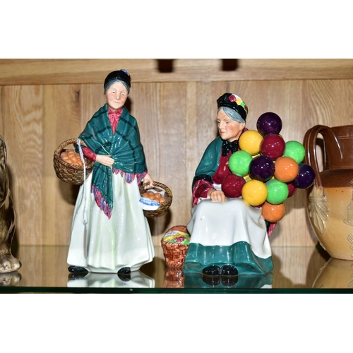 559 - TWO ROYAL DOULTON FIGURES, 'The Orange Lady' HN1953 and 'The Old Balloon Seller' HN1315 (2)