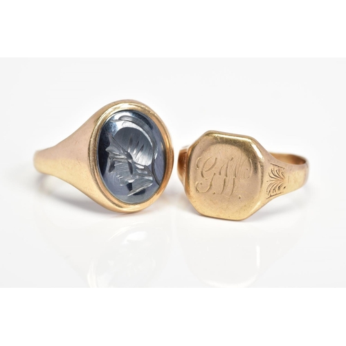 56 - A 9CT GOLD HEMATITE SIGNET RING and one other, the hematite ring depicting a soldier in profile, hal... 