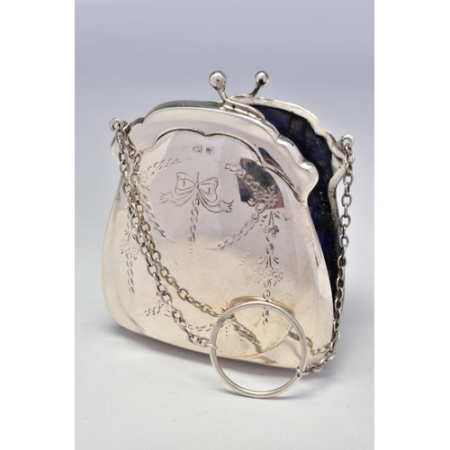 70 - A GEORGE V SILVER PURSE, engraved with ribbons and swags, on a chain with finger ring, blue silk lin... 