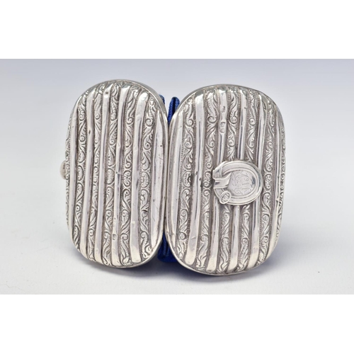 75 - A VICTORIAN SILVER COIN PURSE OF ROUNDED RECTANGULAR FORM, ribbed decoration, belt cartouche engrave... 
