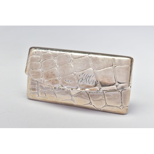 80 - AN EDWARDIAN SILVER CARD CASE OF RECTANGULAR FORM, embossed with a crocodile skin effect, sprung hin... 