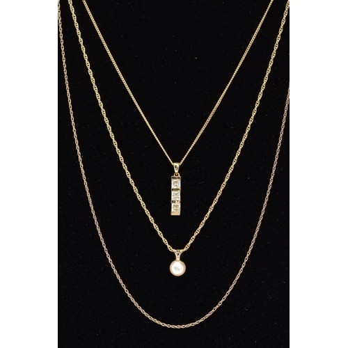 99 - THREE 9CT GOLD PENDANT NECKLACES, the first suspending a cubic zirconia pendant from a fine curb lin... 