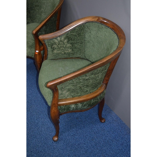 1690 - A PAIR OF LATE 19TH/EARLY 20TH CENTURY WALNUT ARMCHAIRS with swept arm rests covered with green upho... 