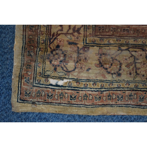 1684 - A LATE 19TH/EARLY 20TH CENTURY TURKISH SILK RUG, in poor condition, pink and ivory ground, central m... 