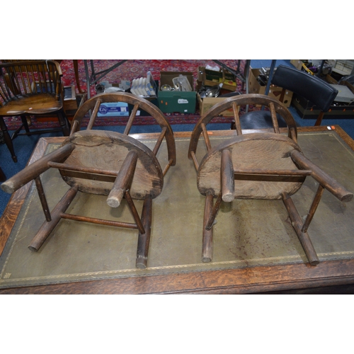 1686 - A PAIR OF 19TH CENTURY AND LATER OAK AND ELM CHILDS ARMCHAIRS with an arched spindled back