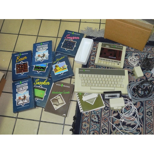 556 - A BOXED ACORN ELECTRON STARTER PACK, with magazines, etc