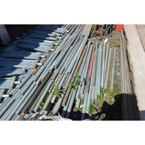 106 - A LARGE COLLECTION OF SCAFFOLDING FOR A COMPLETE STRUCTURE, to include various lengths of galvanised... 