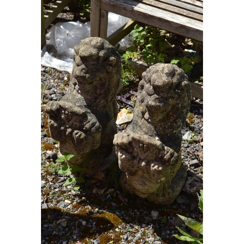 103 - A PAIR OF COMPOSITE DRIVEWAY FIGURES, of a Lion holding a plaque, height 62cm