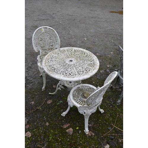 74 - A CIRCULAR WHITE GROUND ALUMINIUM GARDEN TABLE, diameter 69cm x height 69cm and two matching chairs ... 