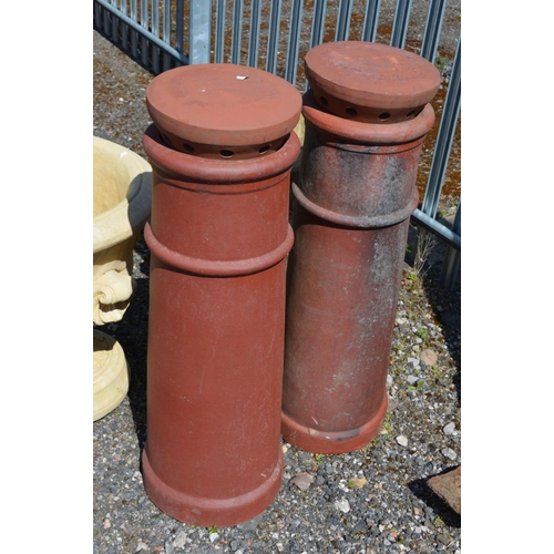 99 - A PAIR OF TERRACOTTA CYLINDRICAL CHIMNEY POTS, with toppers, overall height 100cm x height minus top... 