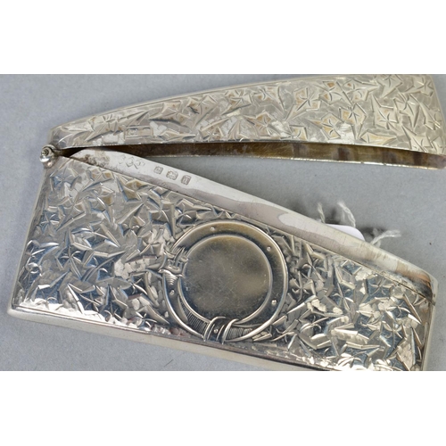 100 - AN EDWARDIAN SILVER CARD CASE OF BOWED RECTANGULAR FORM, hinged top, foliate engraved, circular belt... 