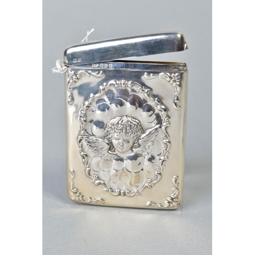 101 - A LATE VICTORIAN SILVER CARD CASE OF RECTANGULAR FORM, hinged top, repousse decorated with central a... 