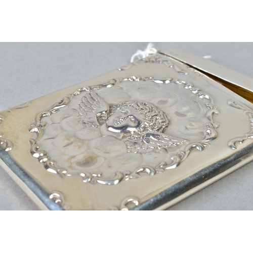 101 - A LATE VICTORIAN SILVER CARD CASE OF RECTANGULAR FORM, hinged top, repousse decorated with central a... 