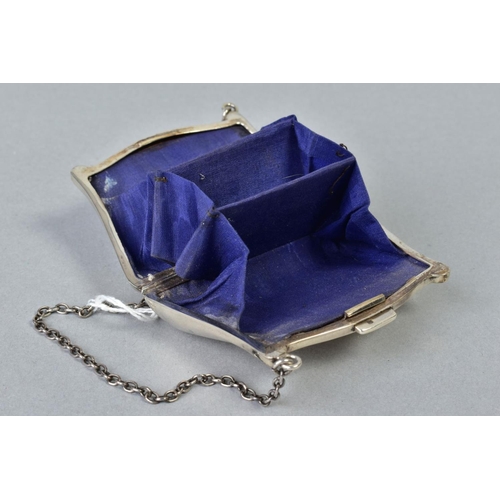 107 - A GEORGE V SILVER PURSE, engine turned decoration, fabric lined interior, on a chain and finger ring... 