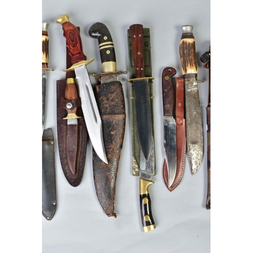 109 - A SMALL COLLECTION OF SEVENTEEN KNIVES AND DAGGERS, mainly hunting style, Eastern, Middle Eastern, E... 