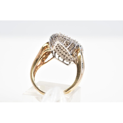 11 - A 9CT GOLD DIAMOND DRESS RING, the marquise shape panel claw set with single cut diamonds in a tiere... 