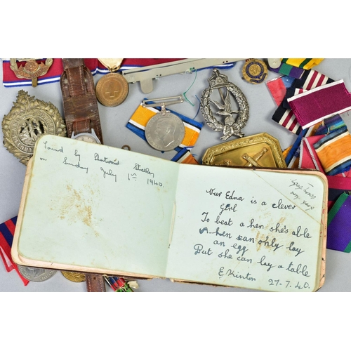 111 - A SMALL BOX OF MILITARIA, to include cap badges, two defence medals 1939-45, a military style wristw... 