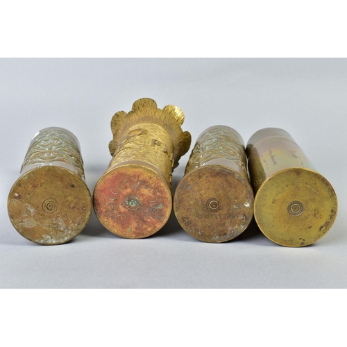 114 - FOUR BRASS SHELL CASES, three of which are trench art, to include one named and dated PAISSY1917