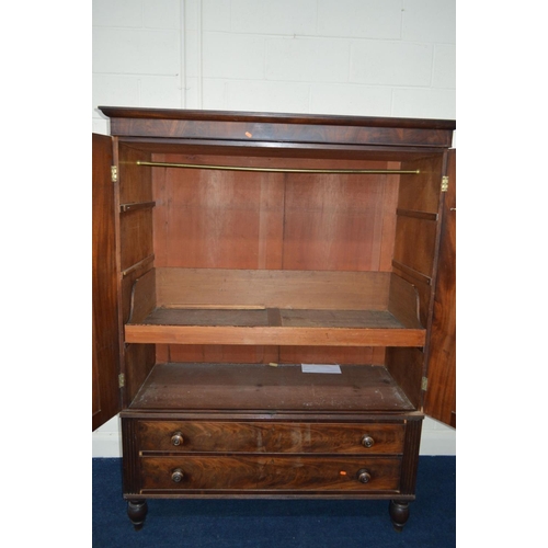 1376 - A GEORGIAN MAHOGANY PANELLED TWO DOOR LINEN PRESS with a single linen slide above two long drawers o... 