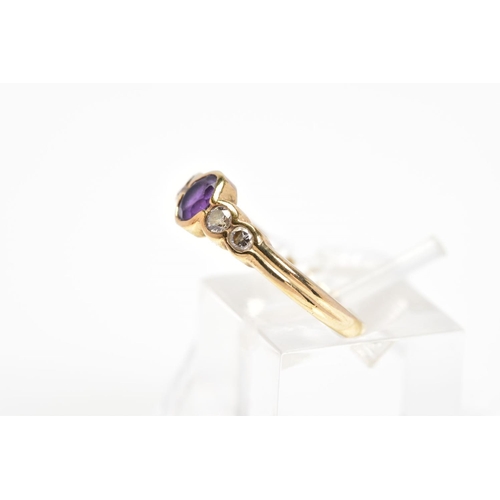 23 - A 9CT GOLD AMETHYST AND DIAMOND RING, designed with a central oval amethyst in a collet setting with... 