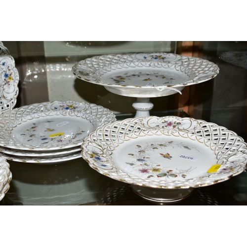 256 - A TWELVE PIECE GERMAN PORCELAIN DESSERT SET, No 2270 butterfly and foliage pattern with pierced edgi... 