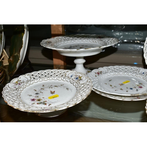 256 - A TWELVE PIECE GERMAN PORCELAIN DESSERT SET, No 2270 butterfly and foliage pattern with pierced edgi... 