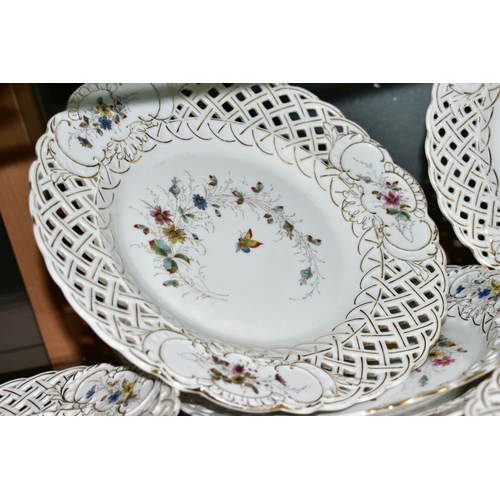 256 - A TWELVE PIECE GERMAN PORCELAIN DESSERT SET, No 2270 butterfly and foliage pattern with pierced edgi... 