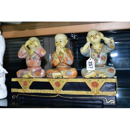 257 - A MODERN FIGURE GROUP OF BUDDHAS, in the See No Evil, Hear No Evil and Speak No Evil positions, heig... 