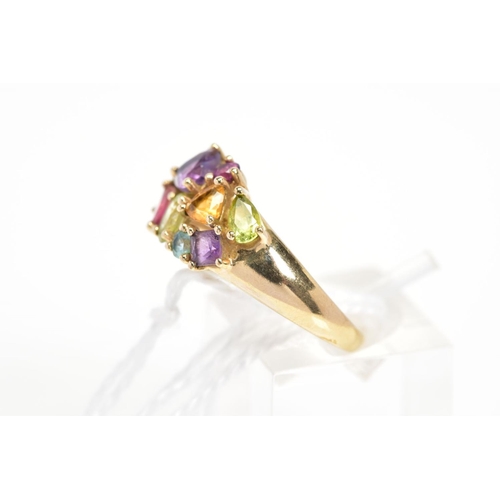 27 - A 9CT GOLD MULTI-GEM RING, designed with various shaped claw set gems including amethyst, topaz and ... 