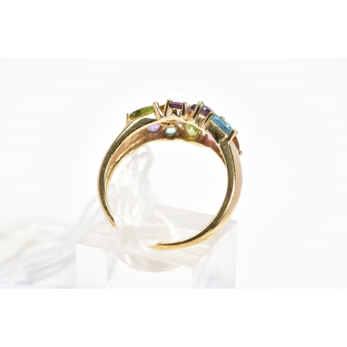 27 - A 9CT GOLD MULTI-GEM RING, designed with various shaped claw set gems including amethyst, topaz and ... 