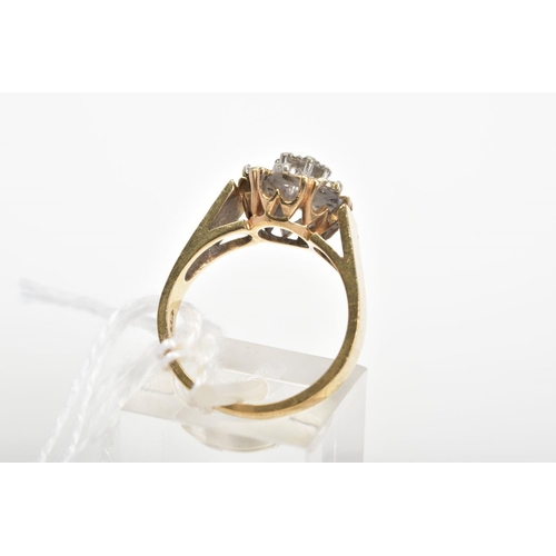 28 - A 9CT GOLD DIAMOND CLUSTER RING, designed as a tiered cluster of single cut diamonds within illusion... 