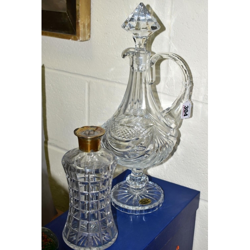 304 - A BOXED VERITABLE CRISTAL TAILLE MAIN CLARET JUG, approximate height 42cm, together with silver coll... 