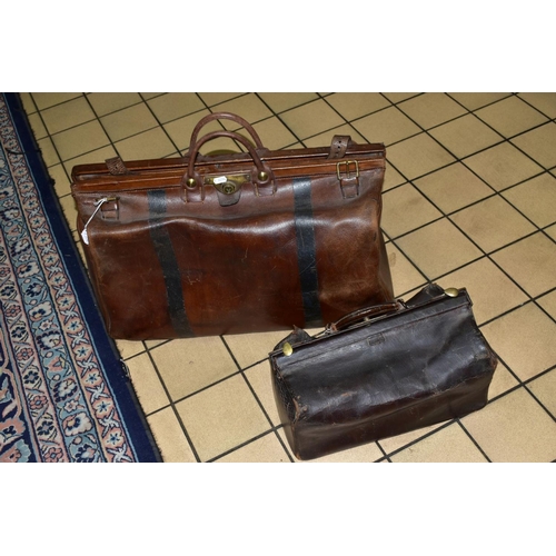 309 - A LARGE LEATHER GLADSTONE BAG, with two straps and lock (missing key), length approximately 63cm, ma... 