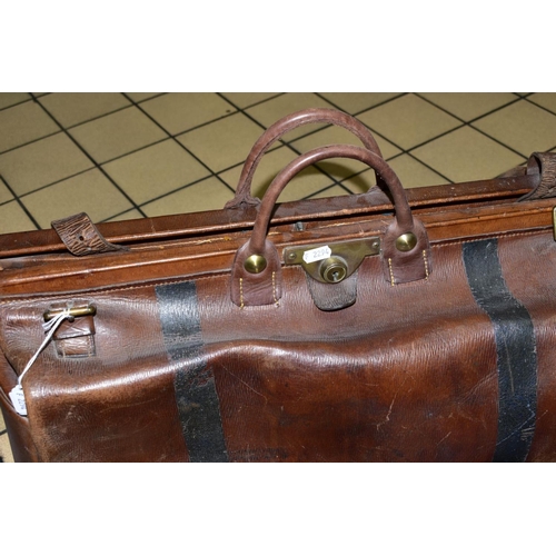 309 - A LARGE LEATHER GLADSTONE BAG, with two straps and lock (missing key), length approximately 63cm, ma... 