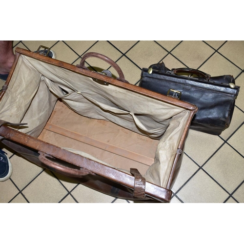 309 - A LARGE LEATHER GLADSTONE BAG, with two straps and lock (missing key), length approximately 63cm, ma... 