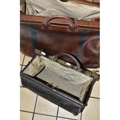 309 - A LARGE LEATHER GLADSTONE BAG, with two straps and lock (missing key), length approximately 63cm, ma... 