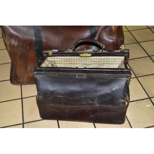 309 - A LARGE LEATHER GLADSTONE BAG, with two straps and lock (missing key), length approximately 63cm, ma... 