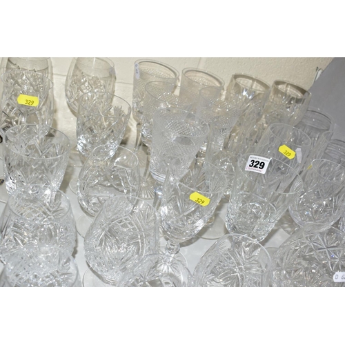 329 - A COLLECTION OF CUT GLASS etc to include Bohemian wine glasses, unmarked brandy and whisky glasses, ... 