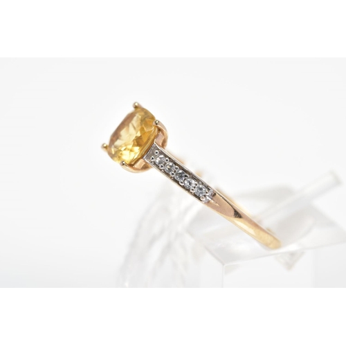 33 - A 9CT GOLD CITRINE RING, designed with a central cushion shape citrine and circular colourless gems ... 