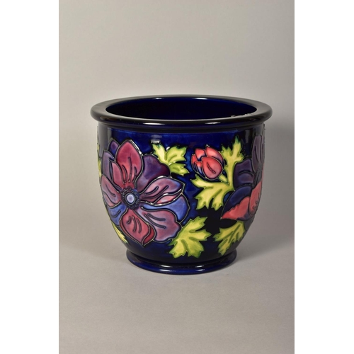 338 - A MOORCROFT POTTERY FOOTED JARDINIERE, Anemone pattern on blue ground, impressed and painted marks t... 