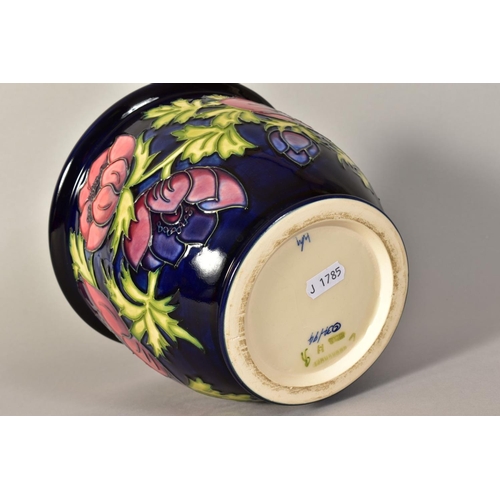 338 - A MOORCROFT POTTERY FOOTED JARDINIERE, Anemone pattern on blue ground, impressed and painted marks t... 