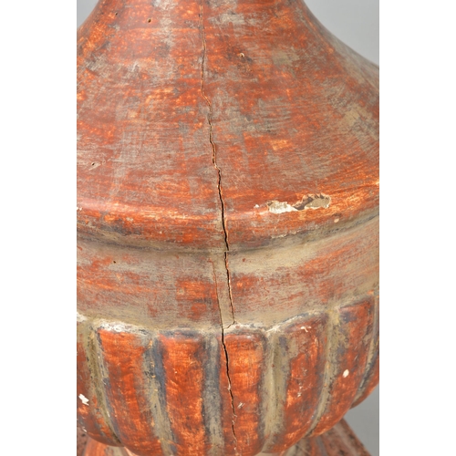 1382 - A 19TH CENTURY PAINTED GESSO FINIAL, the carved wooden urn shaped finial on a circular foot painted ... 