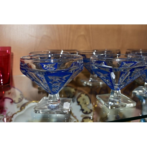 342 - AN ART DECO SHAPED GLASS DECANTER AND MATCHING NINE FOOTED DISHES (10)