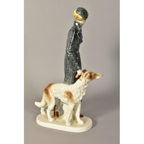 346 - A GERMAN ART DECO STYLE PORCELAIN FIGURE GROUP, of a lady with Borzoi dog, impressed No.184I and sta... 