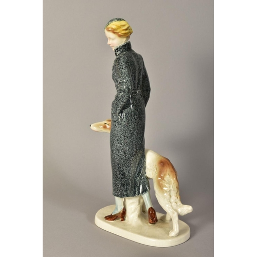 346 - A GERMAN ART DECO STYLE PORCELAIN FIGURE GROUP, of a lady with Borzoi dog, impressed No.184I and sta... 