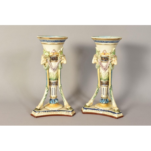 348 - A PAIR OF CONTINENTAL MAJOLICA HUGO LONITZ VASES, of trumpet form having Rams head masks supported o... 