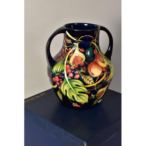 358 - A MOORCROFT POTTERY TWIN HANDLED VASE, 'Queens Choice' pattern, blue backstamp, monogrammed and year... 