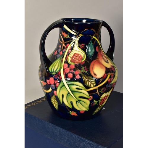 358 - A MOORCROFT POTTERY TWIN HANDLED VASE, 'Queens Choice' pattern, blue backstamp, monogrammed and year... 