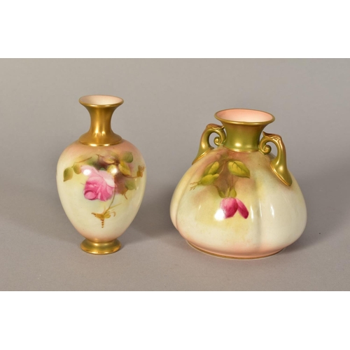 366 - TWO SMALL ROYAL WORCESTER VASES, handpainted with roses on blush ground, the quarter lobed twin hand... 